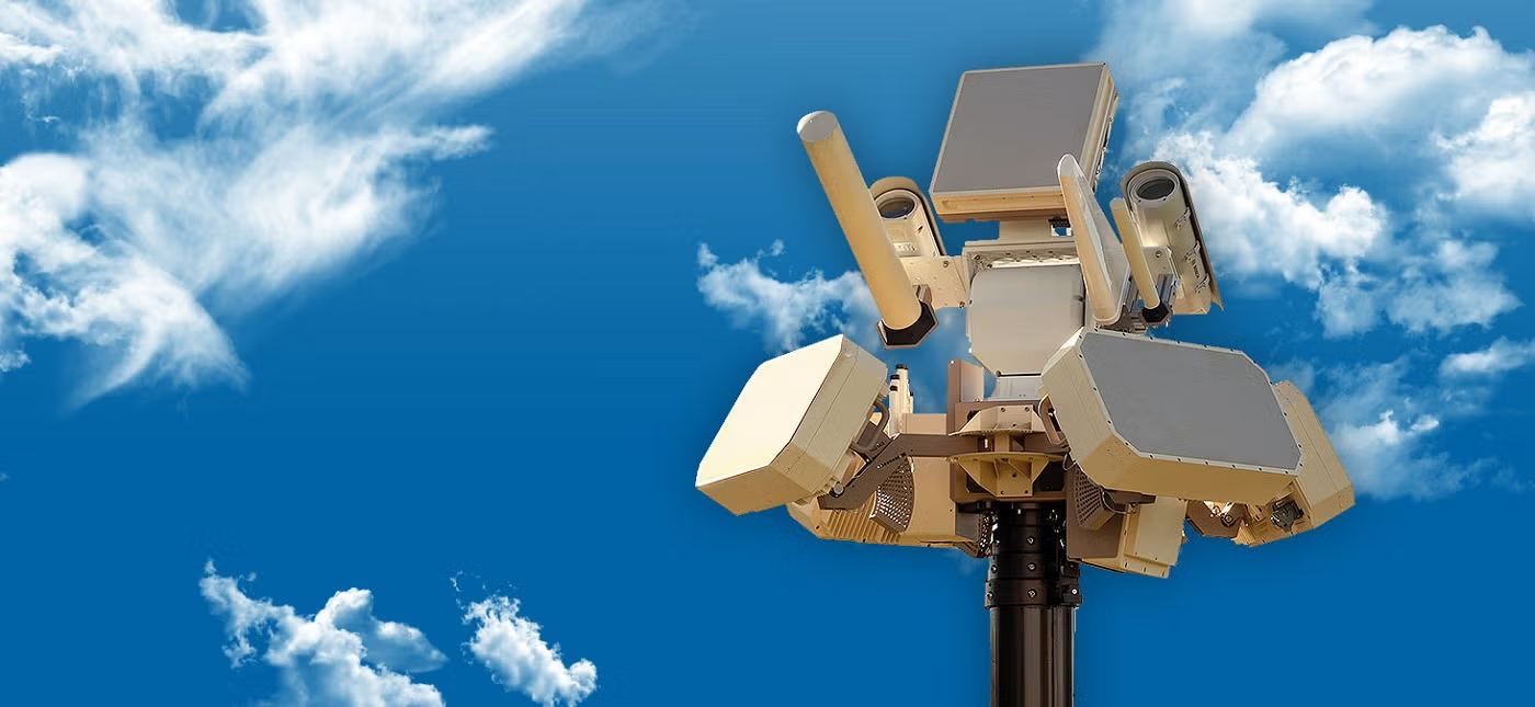 Counter-drone sensor mast against a blue sky